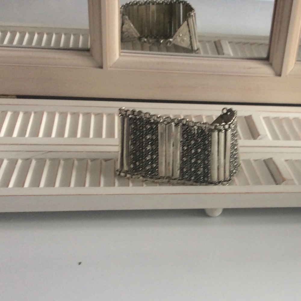 large silver colored bracelet